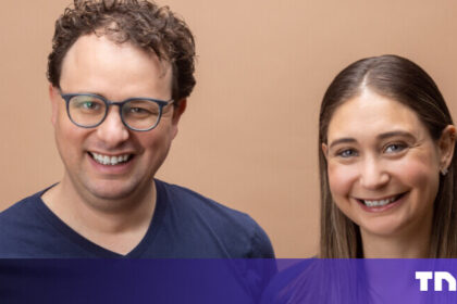 A sleek corporate office lobby in San Francisco featuring the Anthropic logo during their record-breaking $30 billion Series G funding announcement.