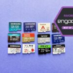 Close-up of several modern microSD cards resting on a sleek metallic surface.