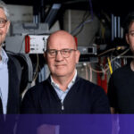 Researchers in a sterile Paris laboratory working on a complex dilution refrigerator for quantum hardware development funded by Quantonation Ventures