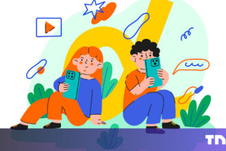 A teenager looking at a glowing smartphone screen behind a digital fence.