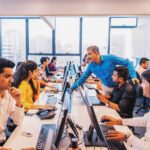 Engineers in a high-tech cleanroom laboratory in Bangalore working on advanced semiconductor wafer fabrication for India's growing deep tech sector.