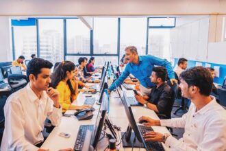 Engineers in a high-tech cleanroom laboratory in Bangalore working on advanced semiconductor wafer fabrication for India's growing deep tech sector.