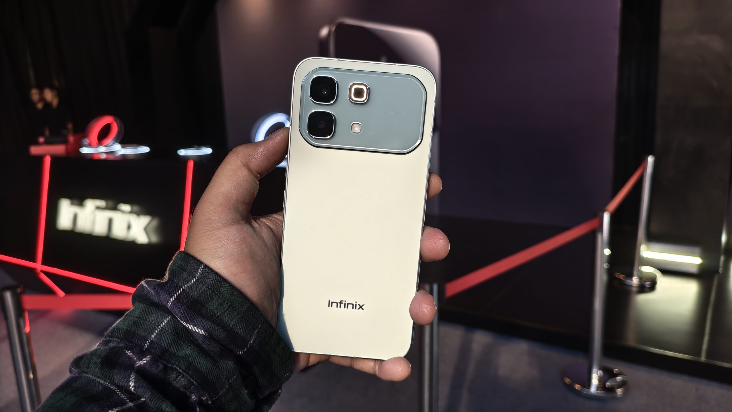 A sleek Infinix Note 60 smartphone displaying a vibrant 144Hz OLED screen next to a 6500mAh battery icon overlay.