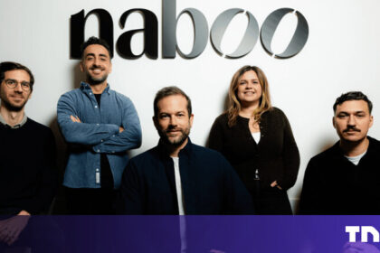 A sleek modern office in New York City where a professional uses an AI procurement platform to manage international corporate events.