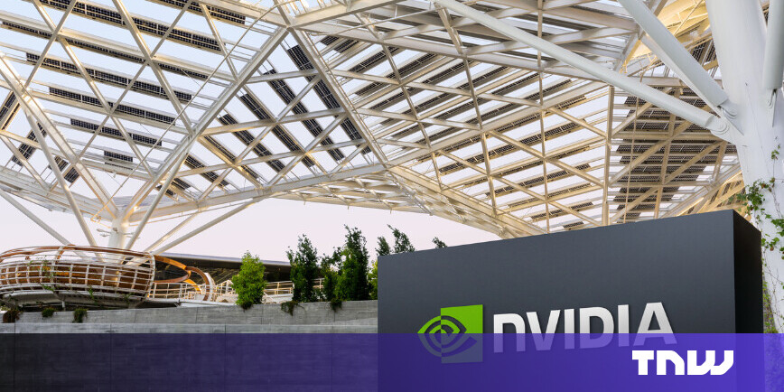 alt="Close-up of an Nvidia GPU processor chip on a server rack illuminated by green data center lights"