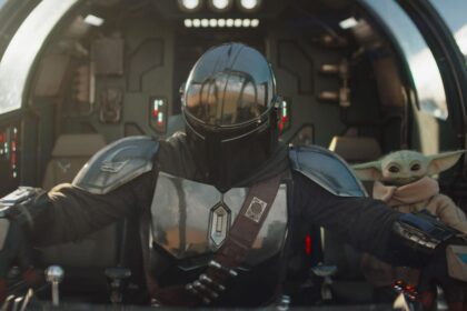 The Mandalorian and Grogu walking through snowy terrain in a Super Bowl commercial teaser.