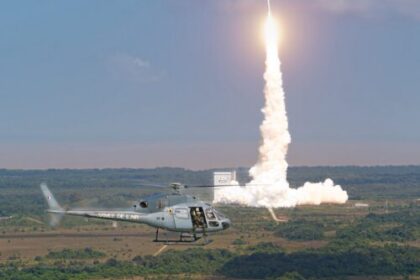 A close-up of a high-tech biometric verification interface glowing on a smartphone screen against a blurred city background.