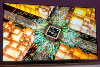 A 65-inch Hisense U8QG TV displaying vibrant 4K HDR cinematic content in a modern, sunlit living room setting.