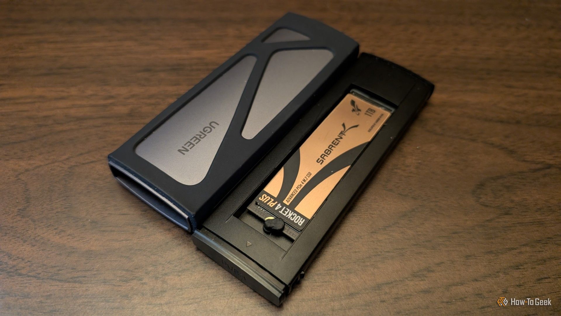 A tangled collection of various USB-C cables and high-end smartphones resting on a modern workstation, highlighting the complexity of universal charging standards.